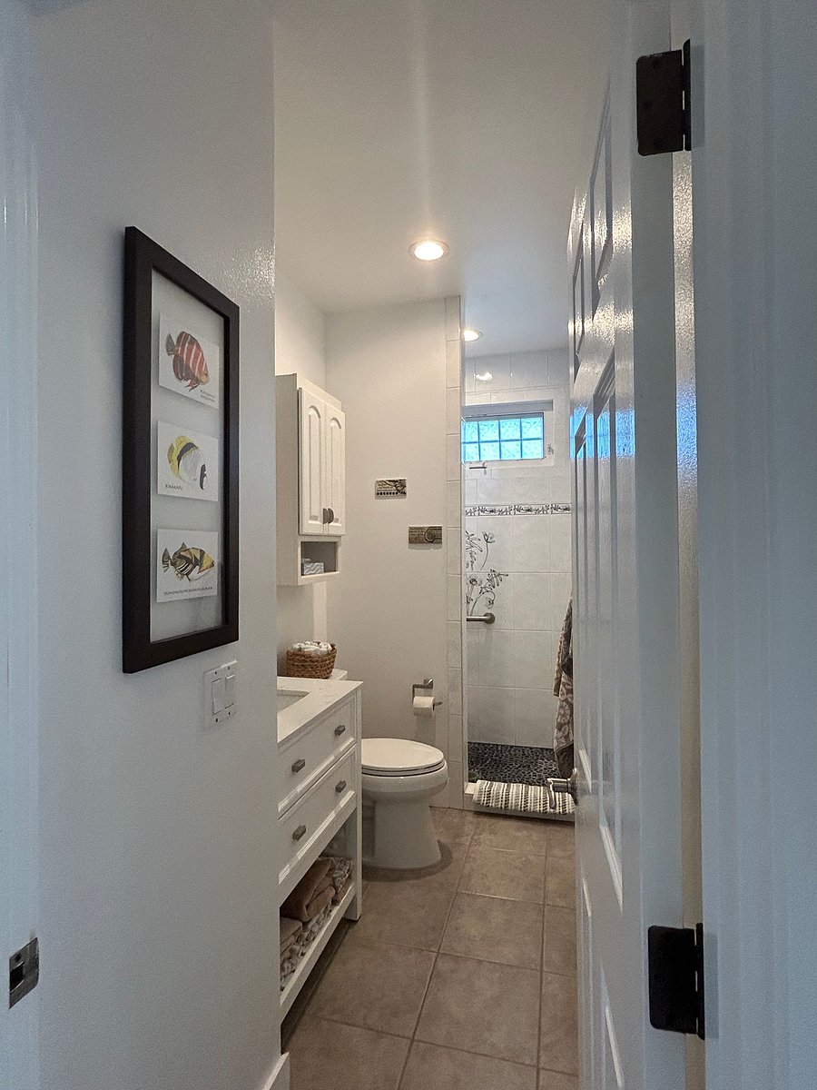 Hall bathroom located right next to Guest Room 3/TV room