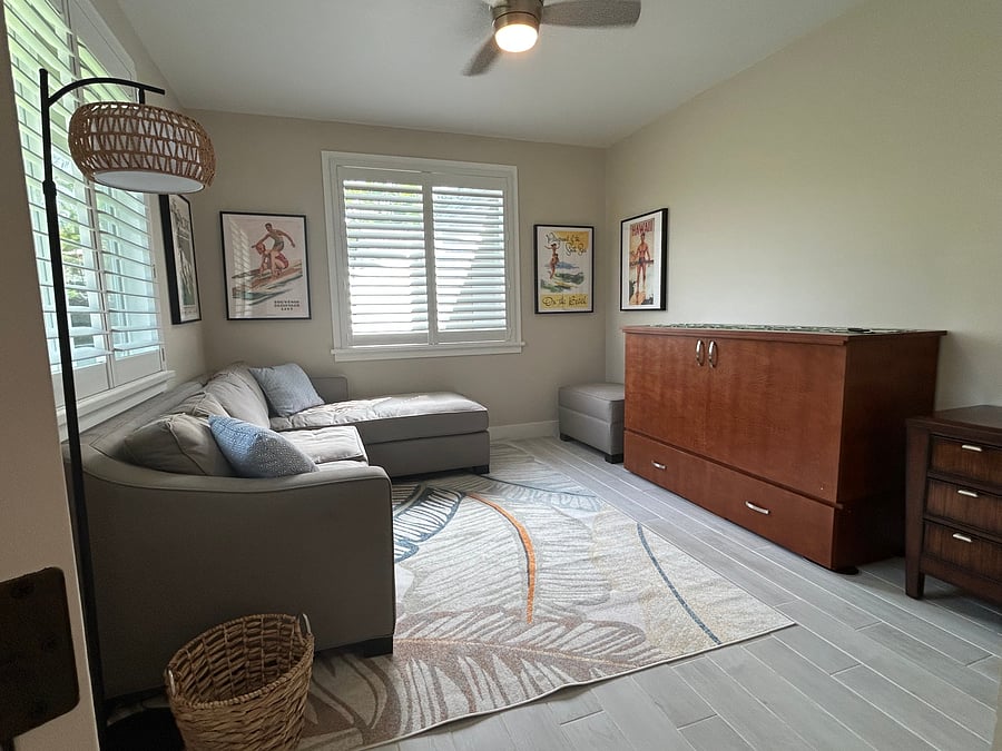 Guest room #2 which also doubles as a TV room.  Cabinet bed unfolds to an exquisite queensized memory foam mattress. 