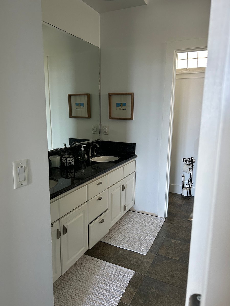 Primary onsuite bathroom with double vanities, closing water closet, jetted tub and incredible shower 