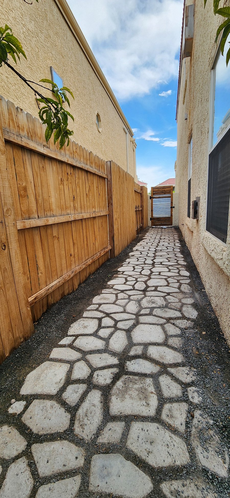Side of house Walkway in the backyard 