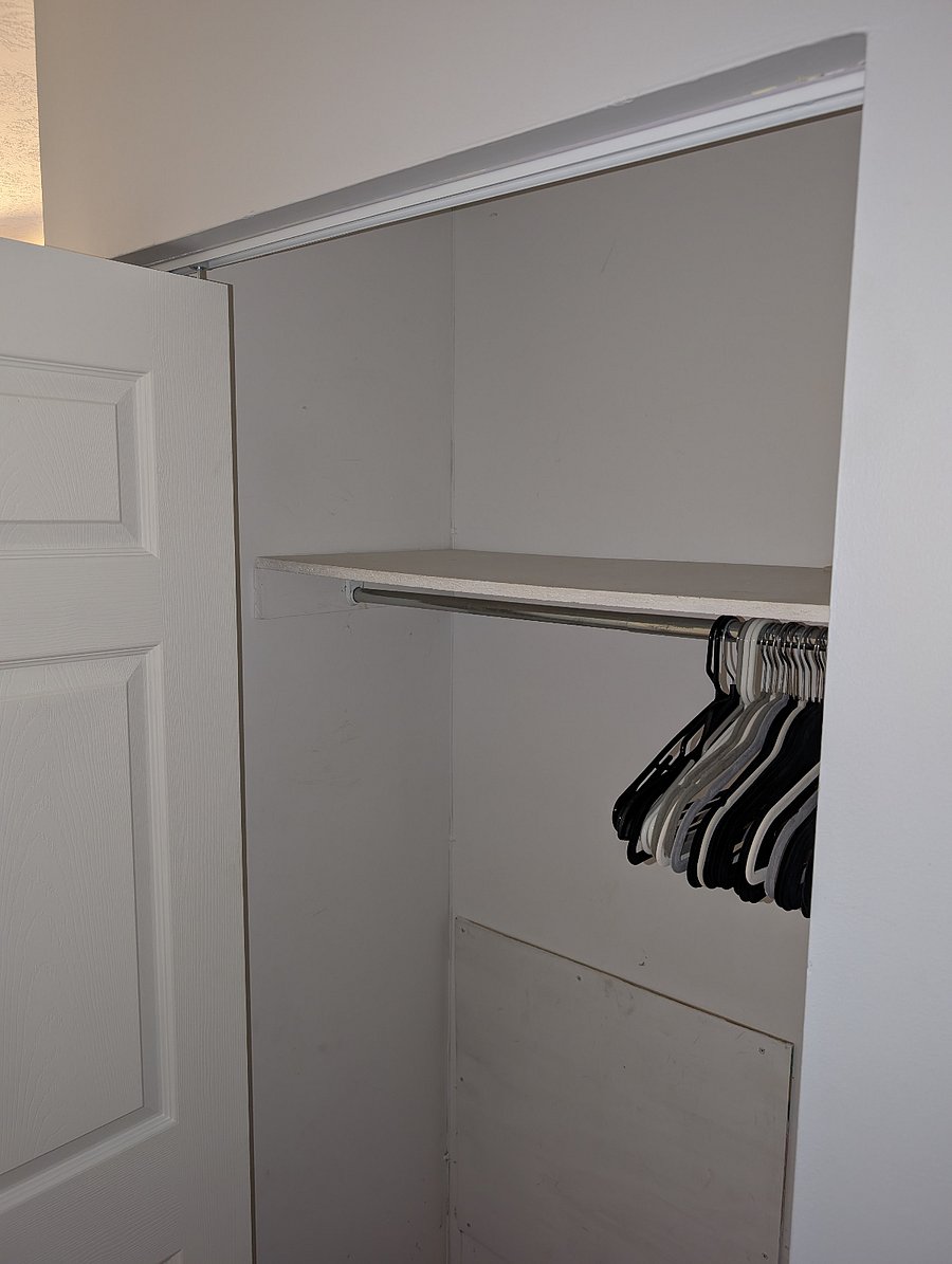 Blue bedroom closet