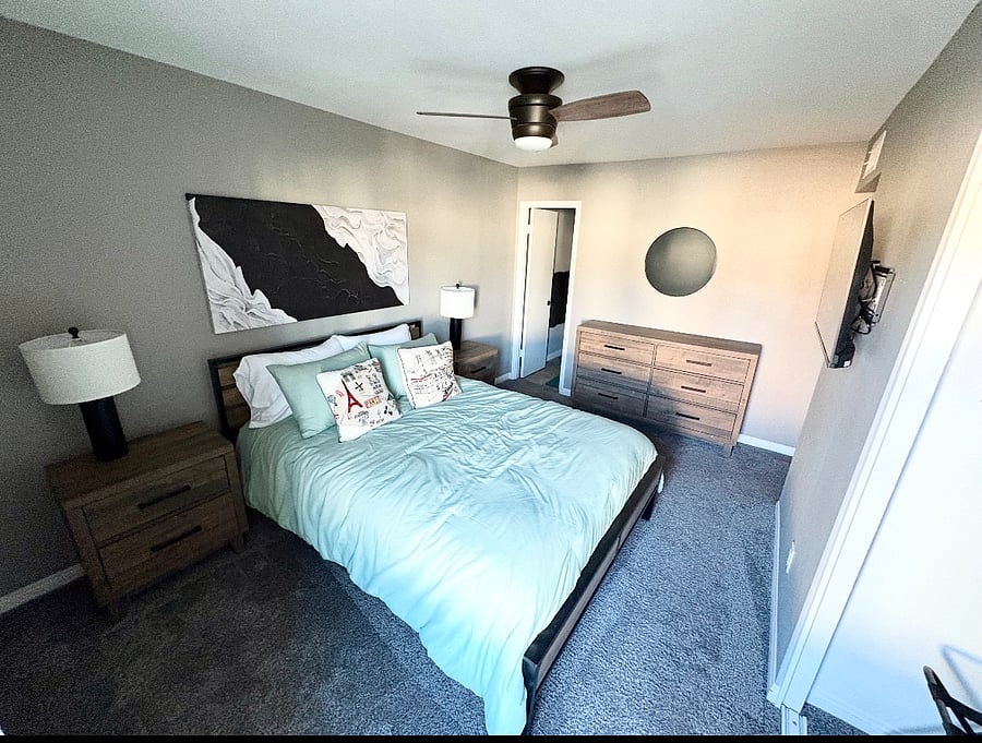 Main bedroom has a Queen bed, large closet, dresser, nightstands, a Smart TV, and it's own bathroom.