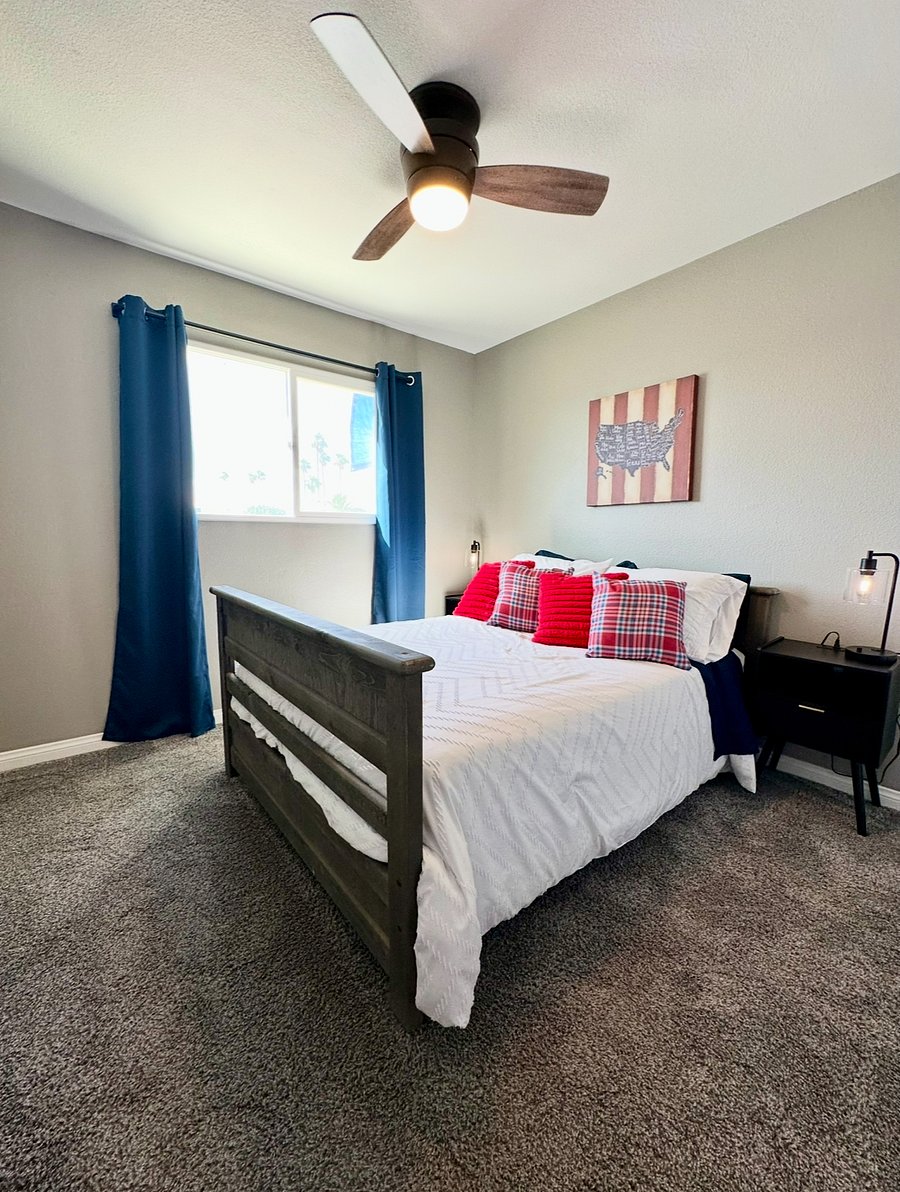 Bedroom 3 has a full-size bed, nightstands, Smart TV & closet.
