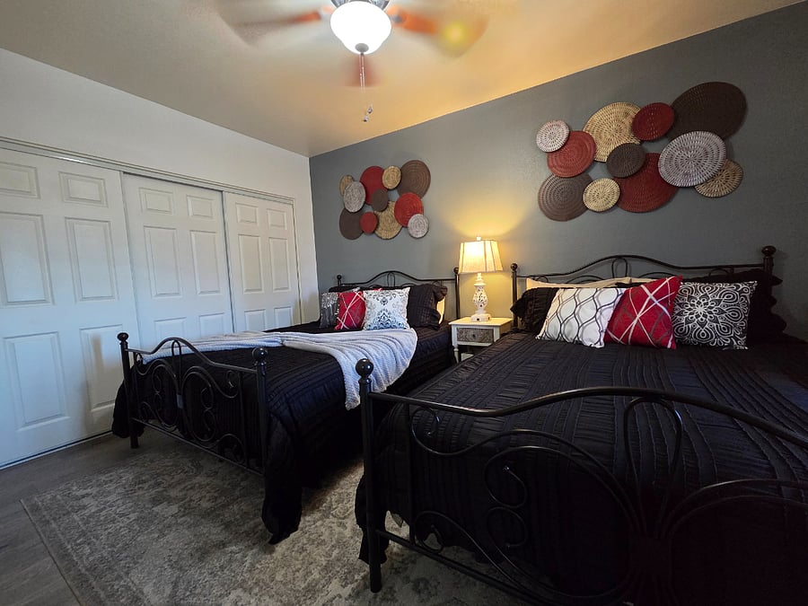 Bedroom 2 offers two queen-size beds