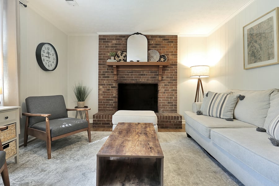 Living Room with Queen Sleeper Sofa and Two Reading Chairs. Fireplace is for looks but we ask you not to use it :) 