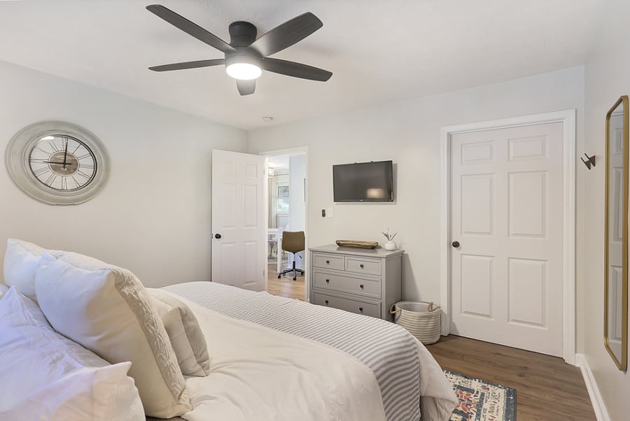 Master Bedroom on Main Level with King Bed and amazing mattress, two nightstands, dresser, smart tv and HUGE walk-in closet!