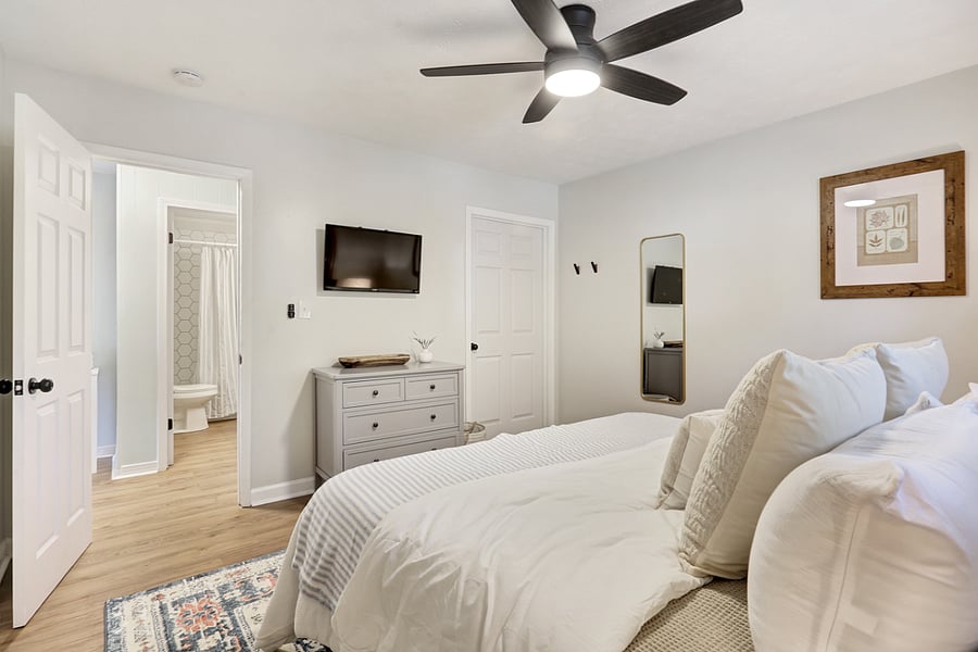 Master Bedroom with dresser and smart tv