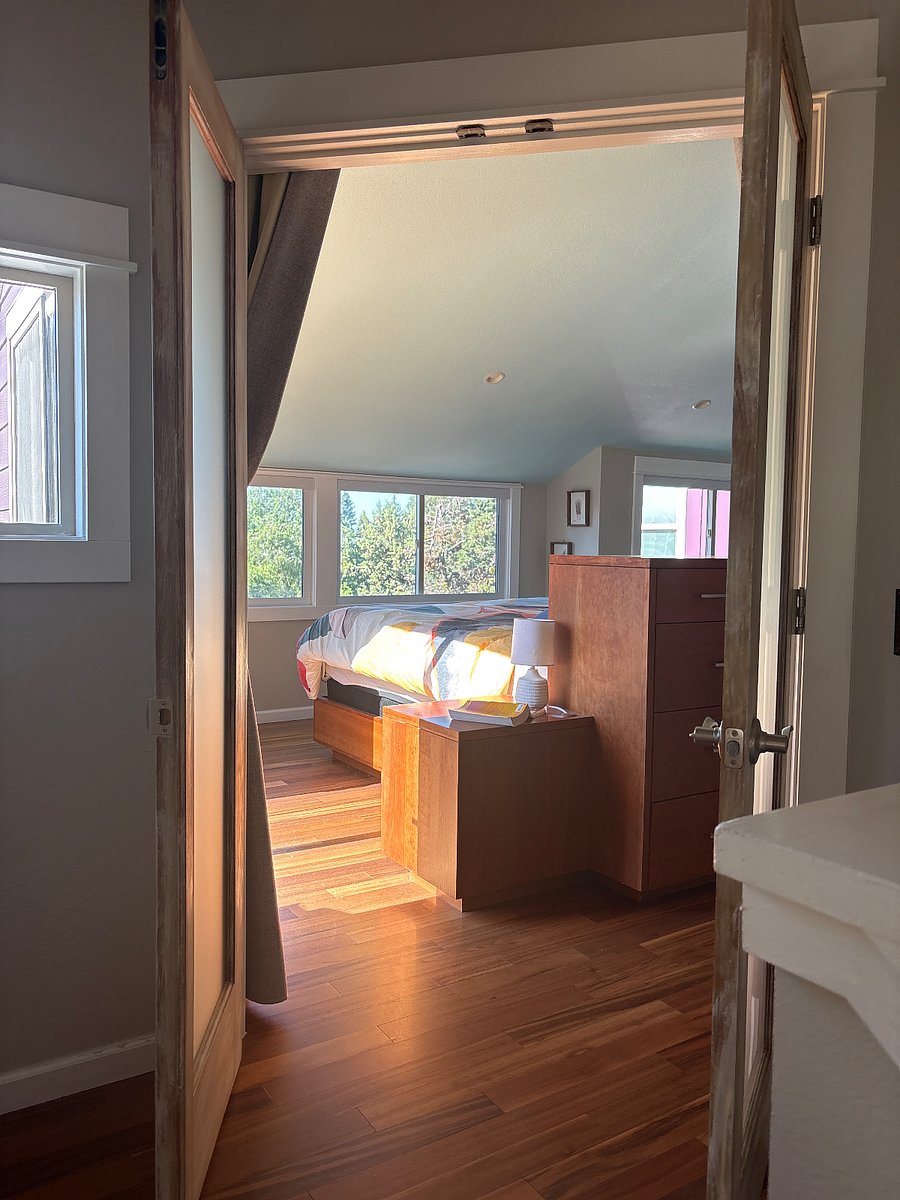 King bed upstairs with its own porch