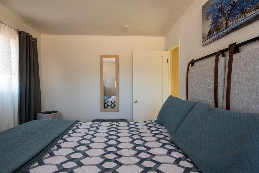 Side view of bed to hallway
