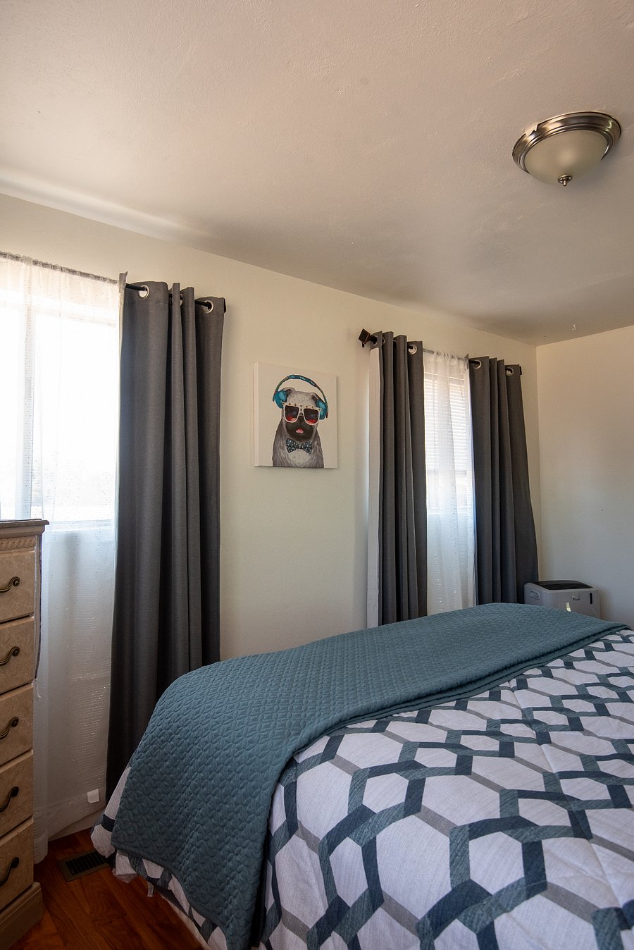 lightened bedroom from 3 different windows
