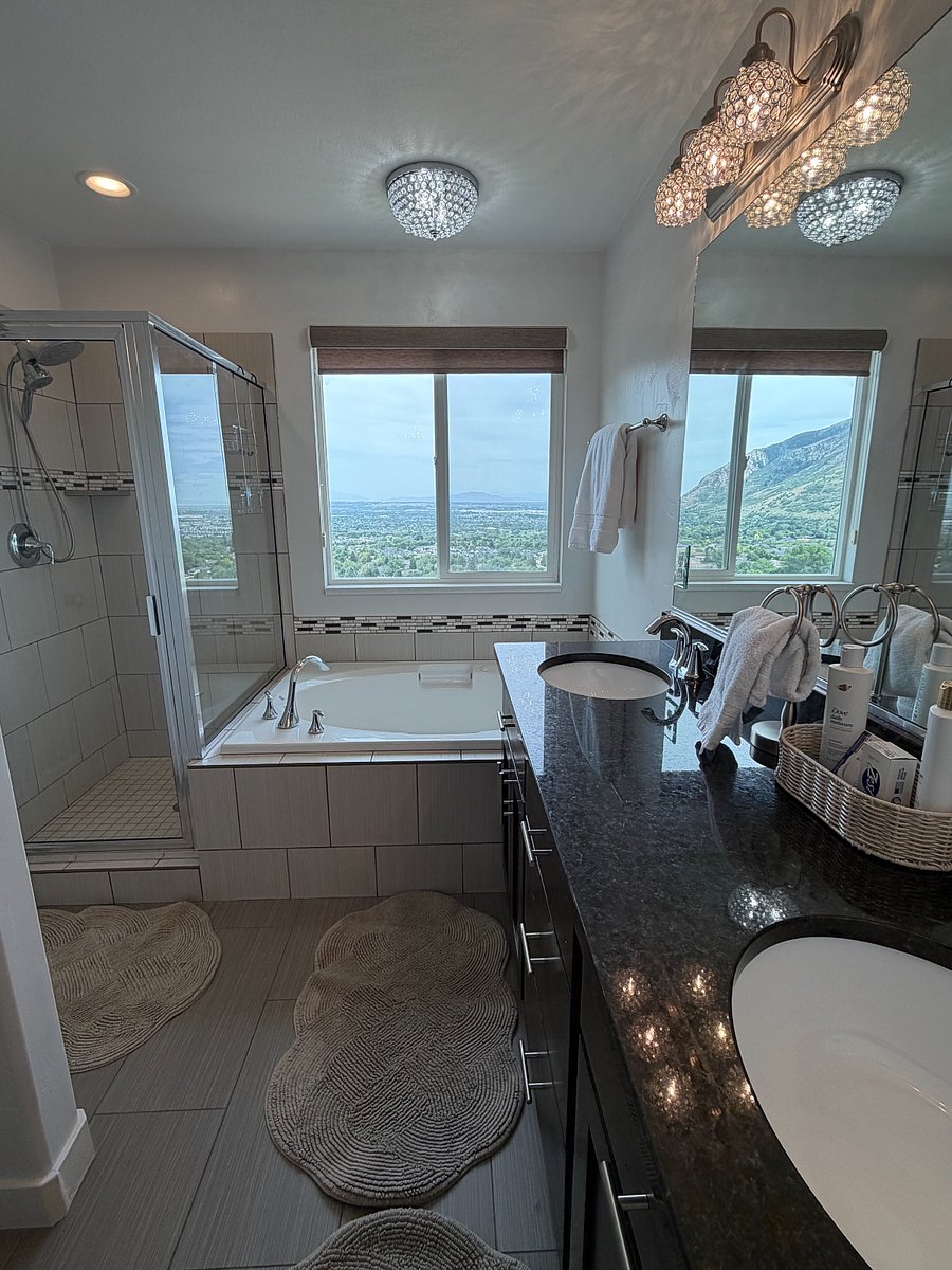 Primary ensuite bath with jet tub and separate shower.