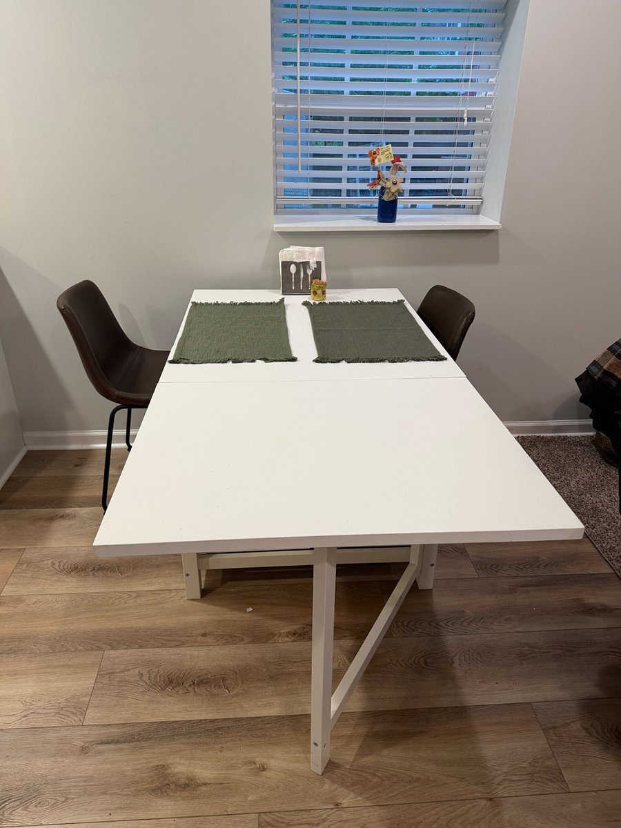 Dining table, shown expanded 