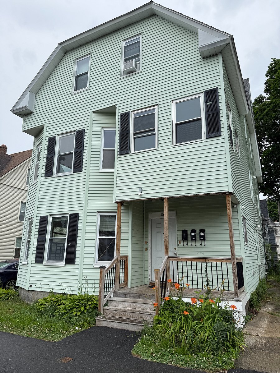 View from the street, double wide driveway on the left.