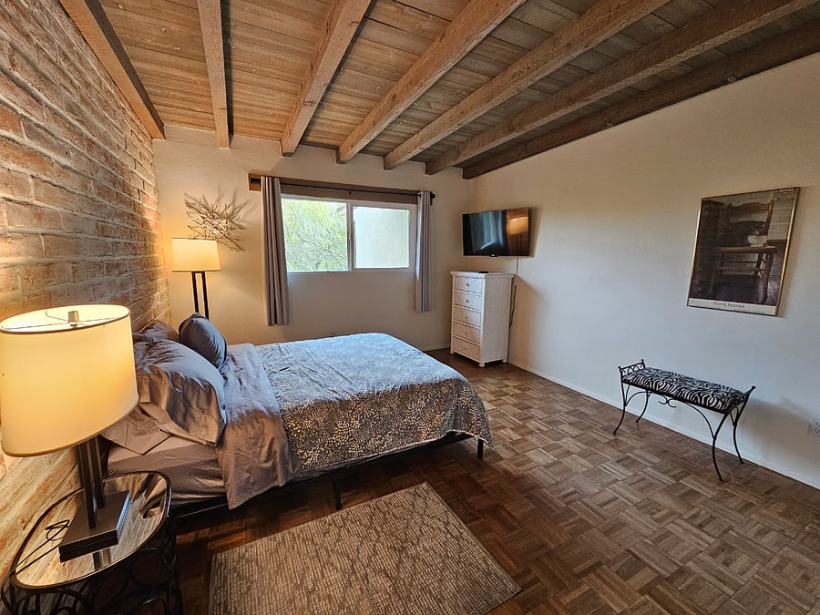 2nd bedroom with queen bed.  Large closet, dresser and 43" TV.