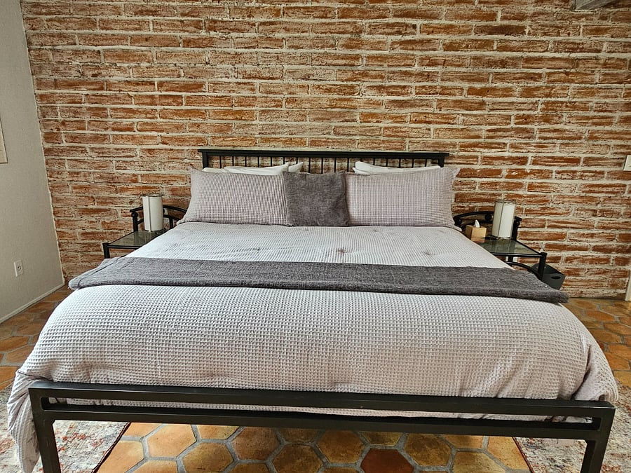 MBR king bed.  Luxurious bedding.  