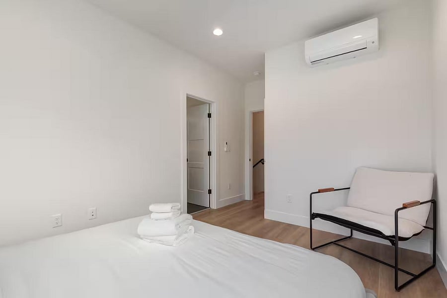 Suite with King Bed and sitting chair