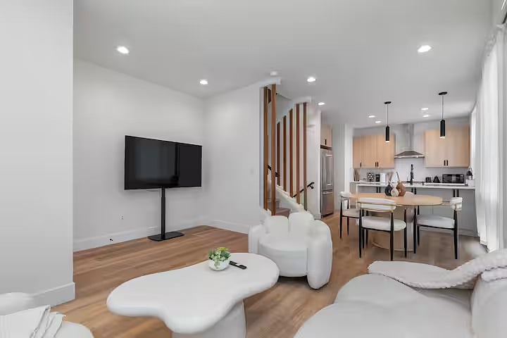 Bright & Modern Living Room, 65 Smart TV with YouTube Streaming