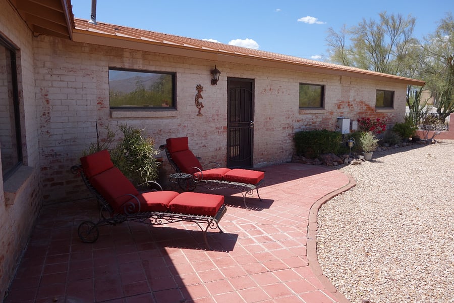 Rear patio and fenced in back yard with Catalina Mountain views.
