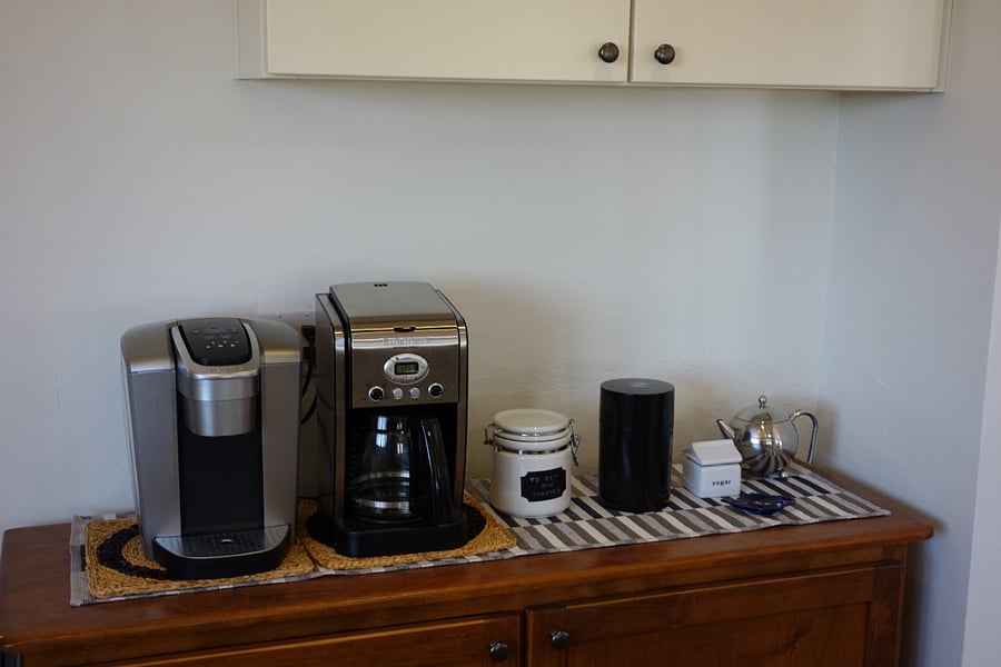 Coffee/tea bar.  Single serve k-cup, 12 cup coffee maker, French Press, tea kettle.