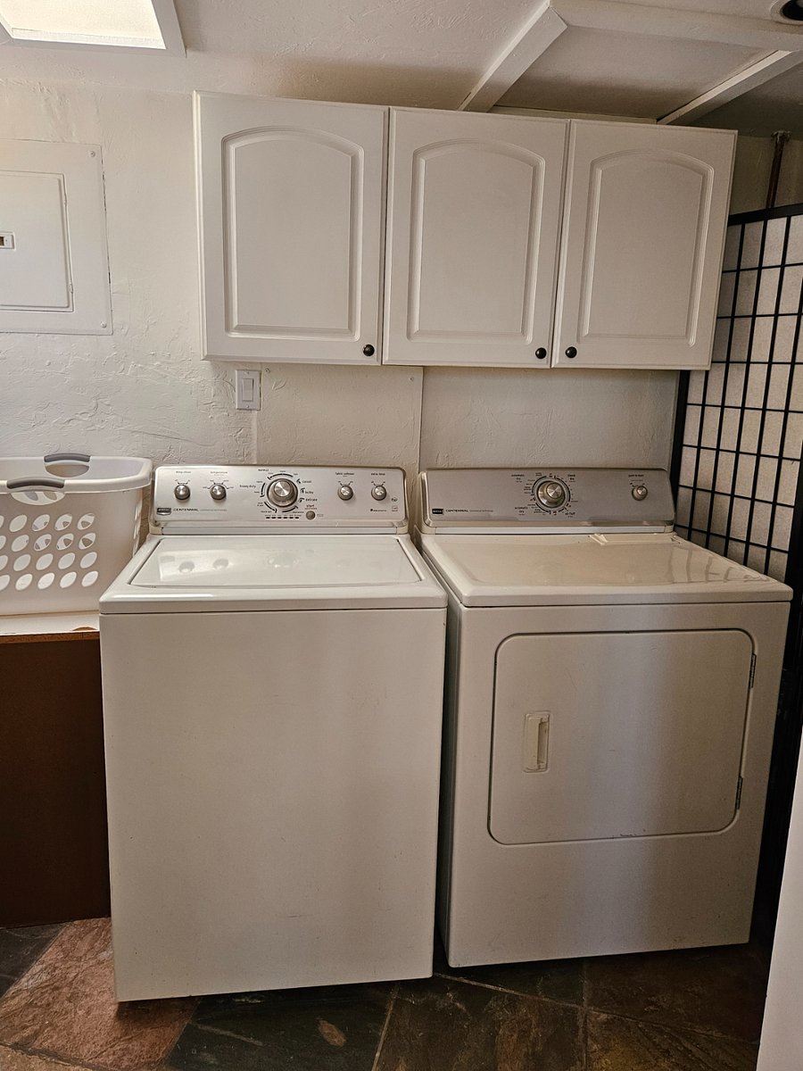 Washer/dryer in laundry room off kitchen. Access to side patio.