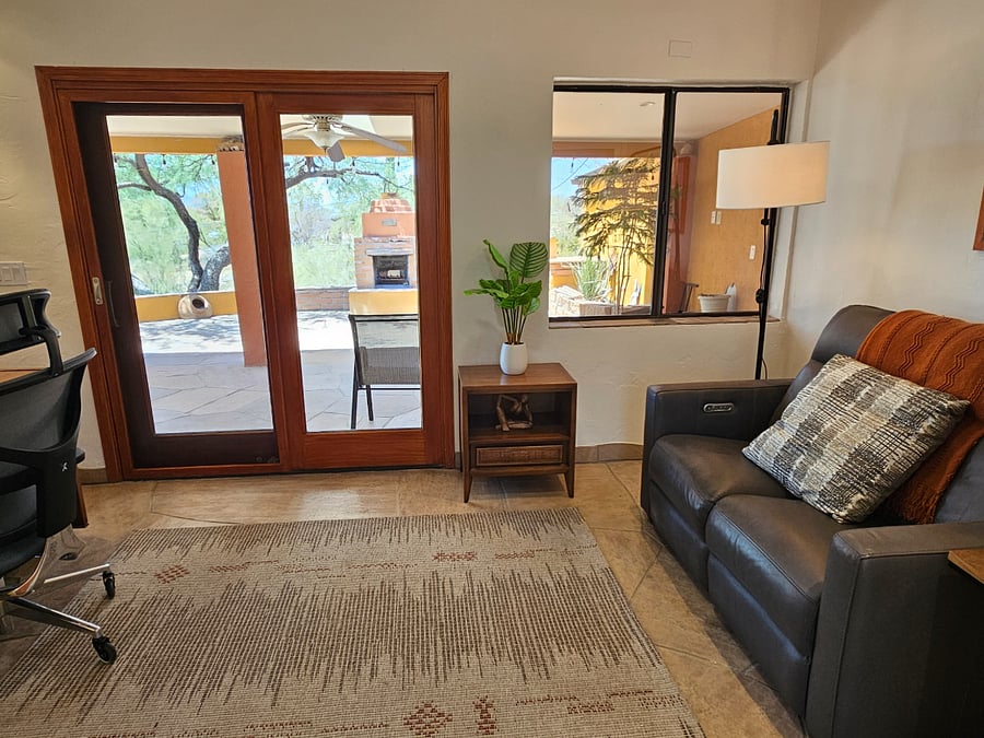Reading nook in office with power recliner loveseat