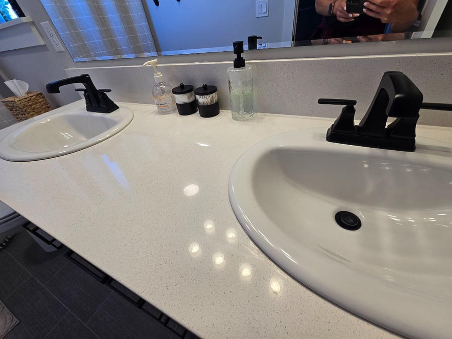 Private includes dual sinks and quartz countertops.