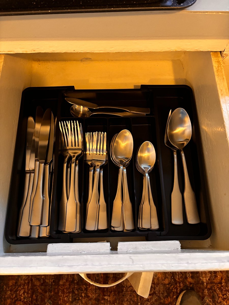 No mismatched utensils here. The kitchen is fully equipped for comfortable, everyday living.
