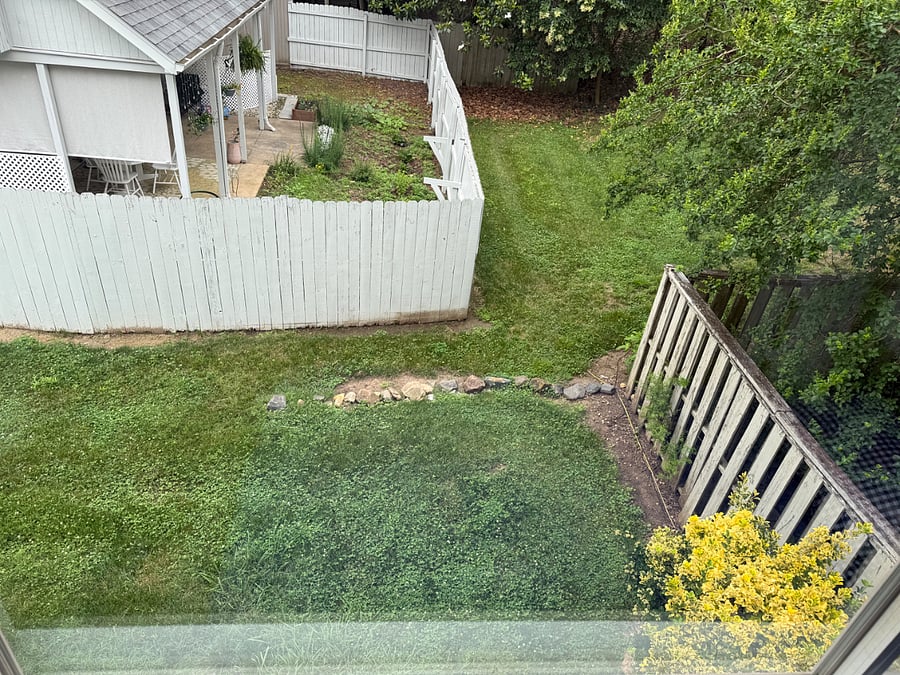 View yard area from primary bedroom.