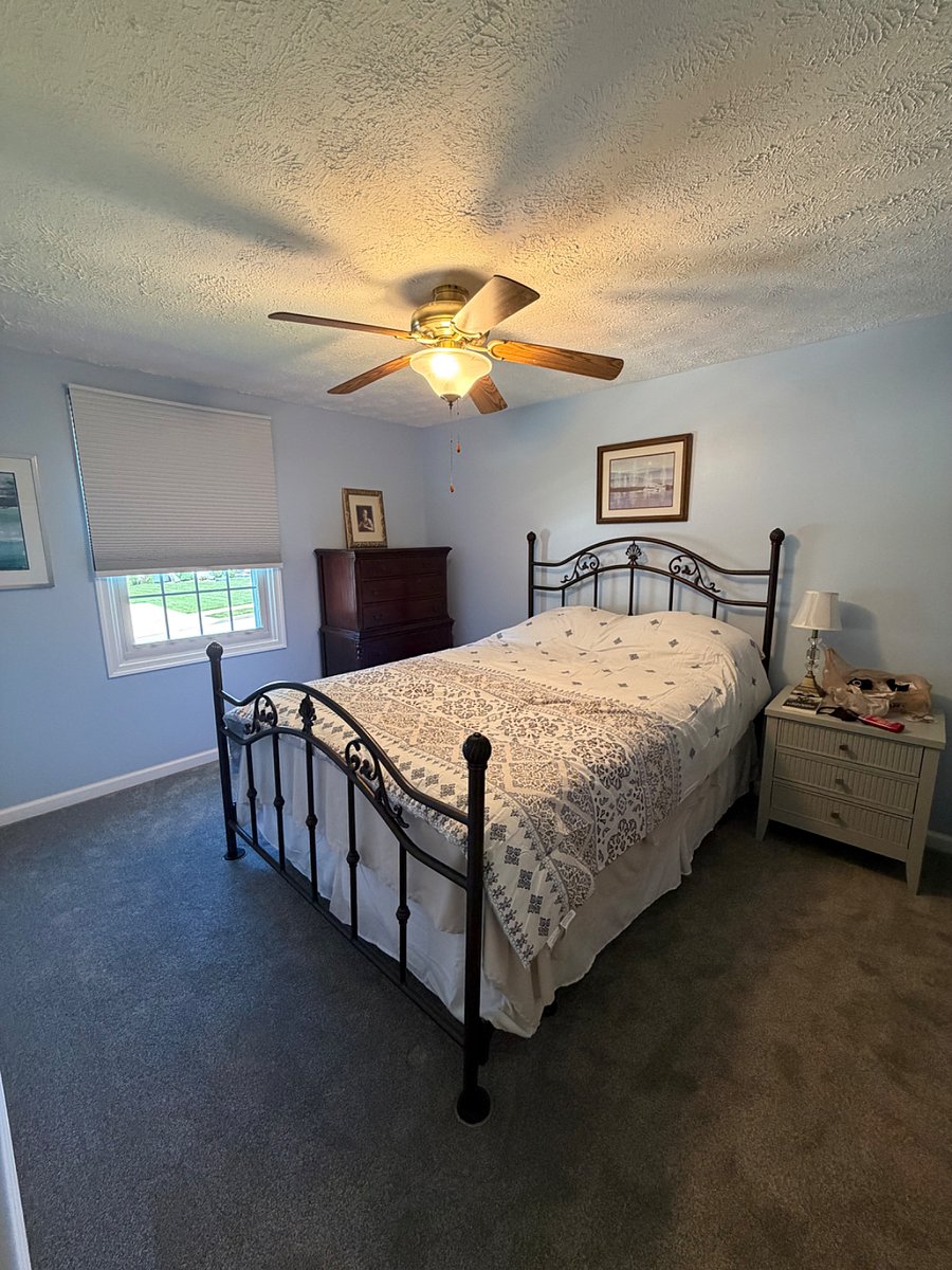 Bedroom 1 with queen bed and private closet 