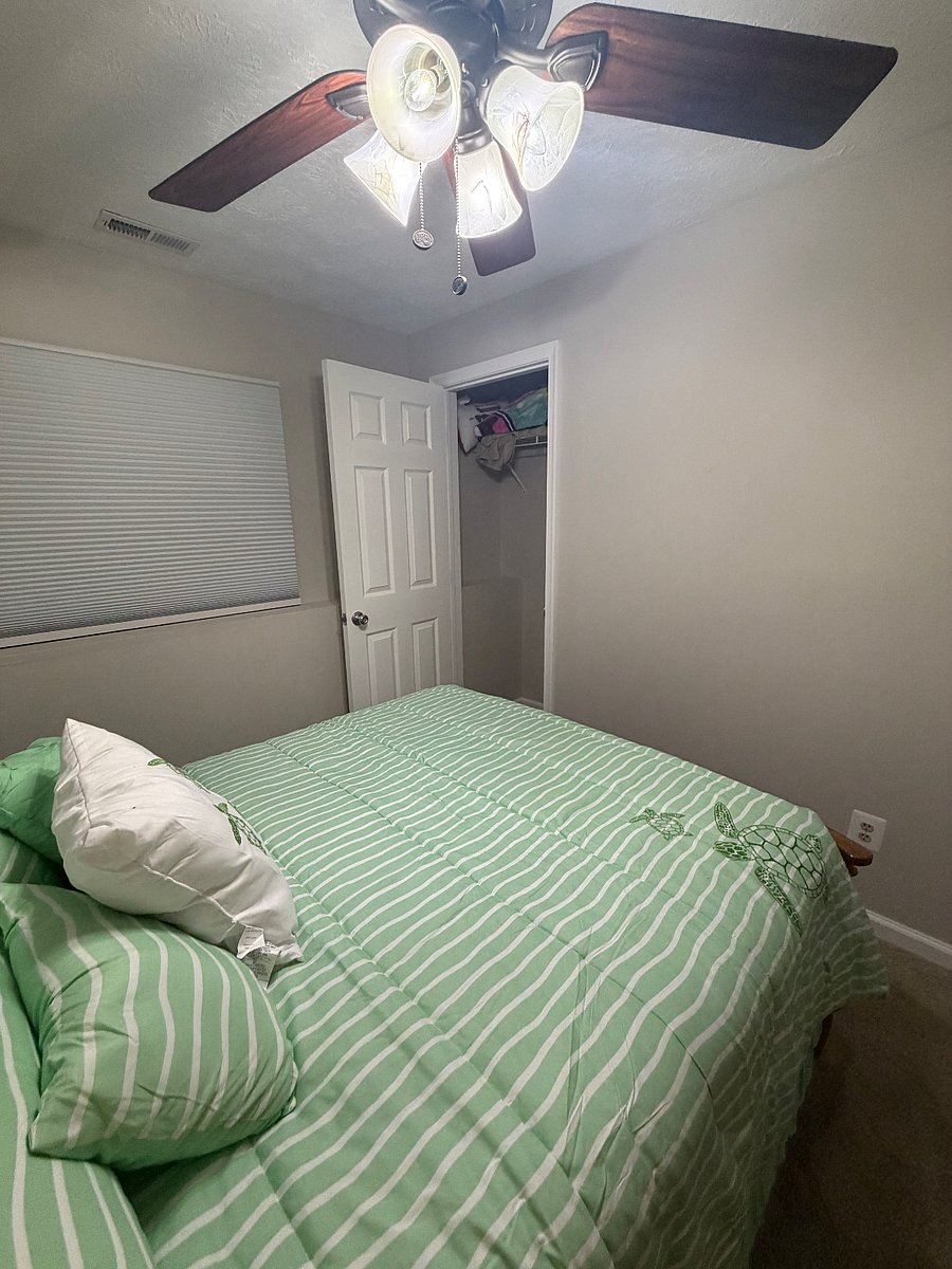 Downstairs bedroom with full bed and closet 
