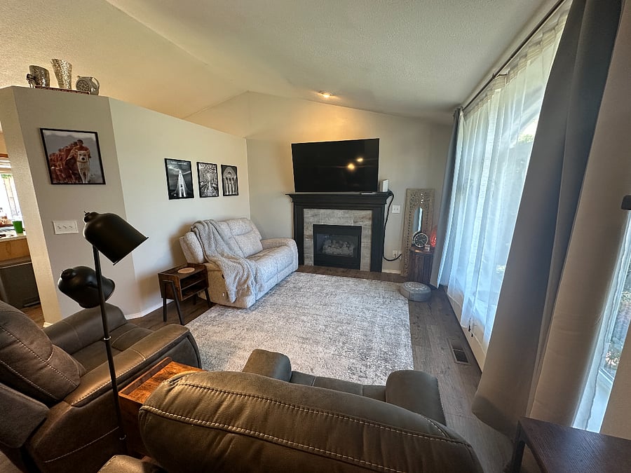 Living Room with two comfy leather recliners with phone chargers built in