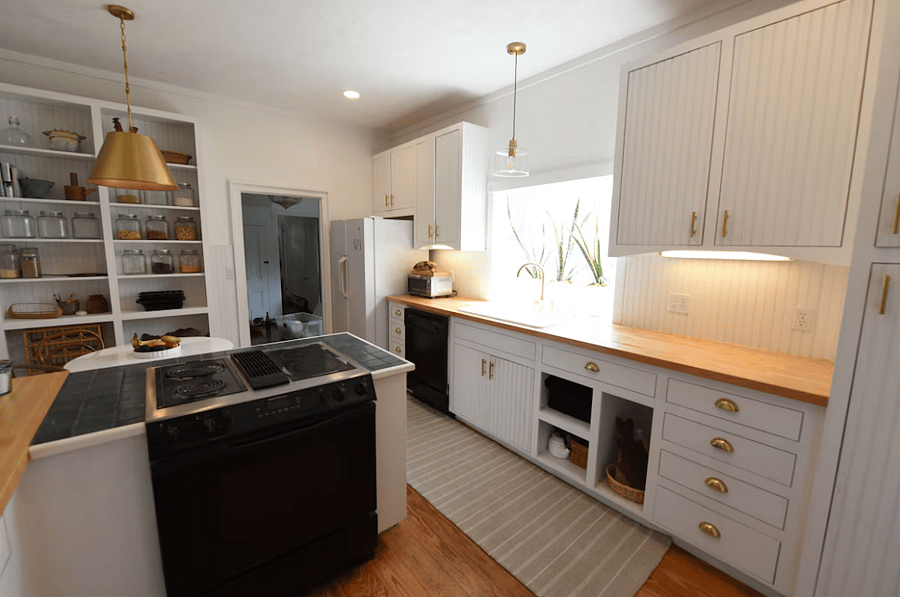 Charming kitchen with all the gadgets you might want for cooking and baking.