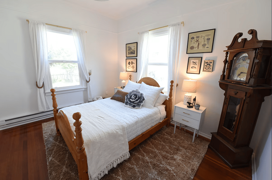 Cozy front bedroom has a double bed with a new Casper mattress.