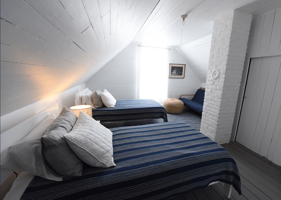 Upstairs bunk room has 2 single beds and a futon. Perfect for kiddos.