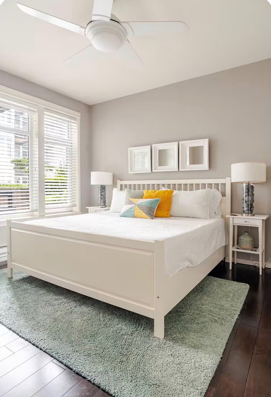 Primary bedroom with new Casper King Bed and oversized windows.