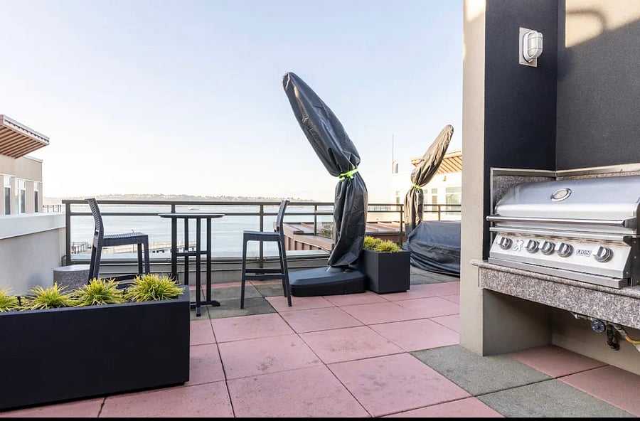 Rooftop Deck with Gas BBQ Grills, ready for hosting guests.