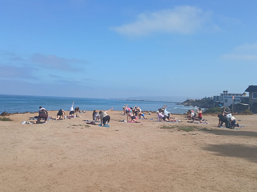 yoga down the street on beach