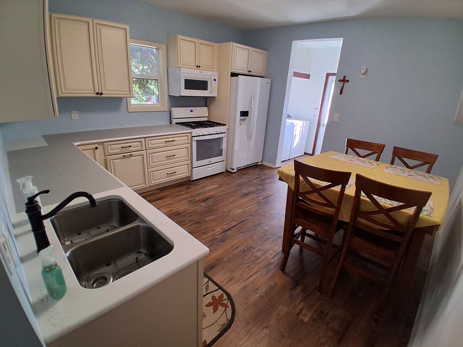 Bright open kitchen with laundry right there!