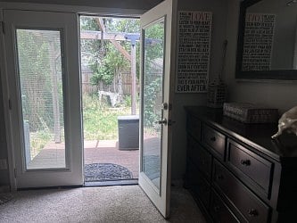 Master Bedroom with patio leading to hot tub