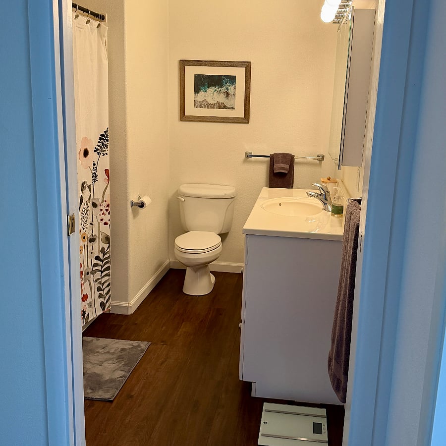 Full bathroom with shower and full tub