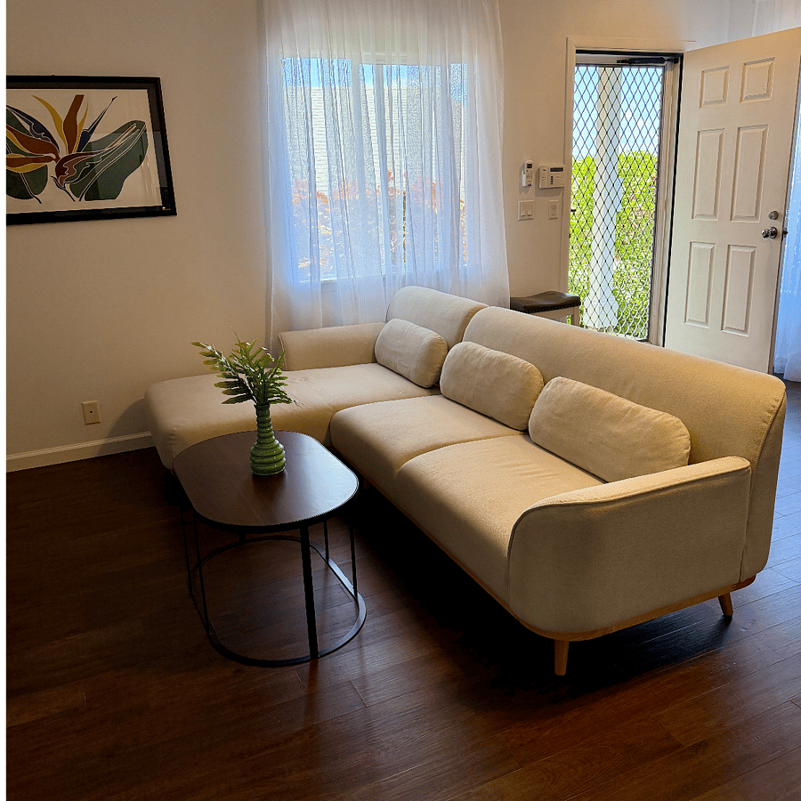 Front door behind sofa