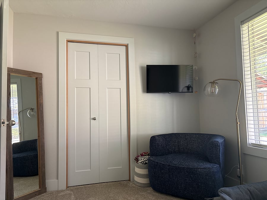 Private lounge room with TV.