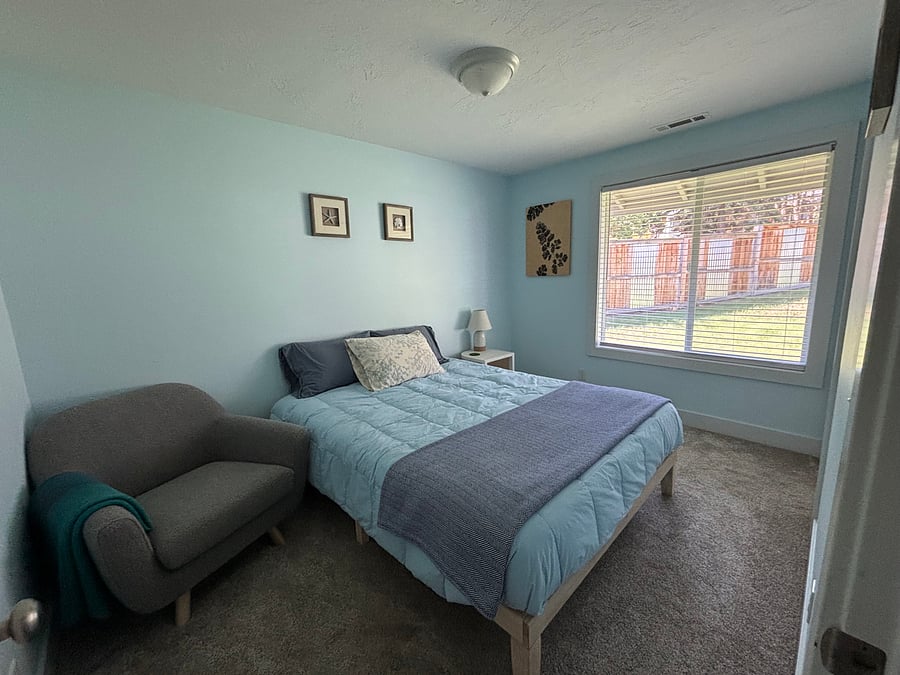 Private bedroom with queen bed.