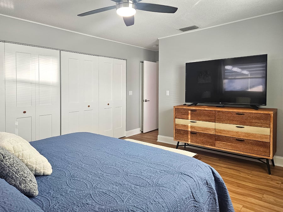 Spacious Master Bedroom with a King Bed, 60" Smart TV and Large Closets