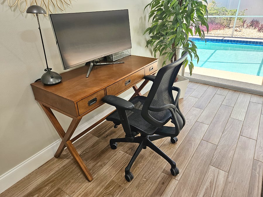 Office Space includes a Desk & Monitor to Hook Up your computer.
