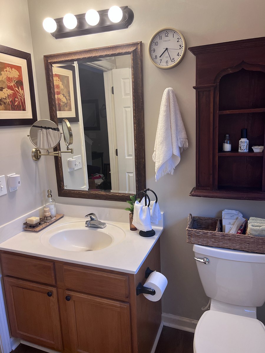 Dedicated hall bath with tub, window, shower.