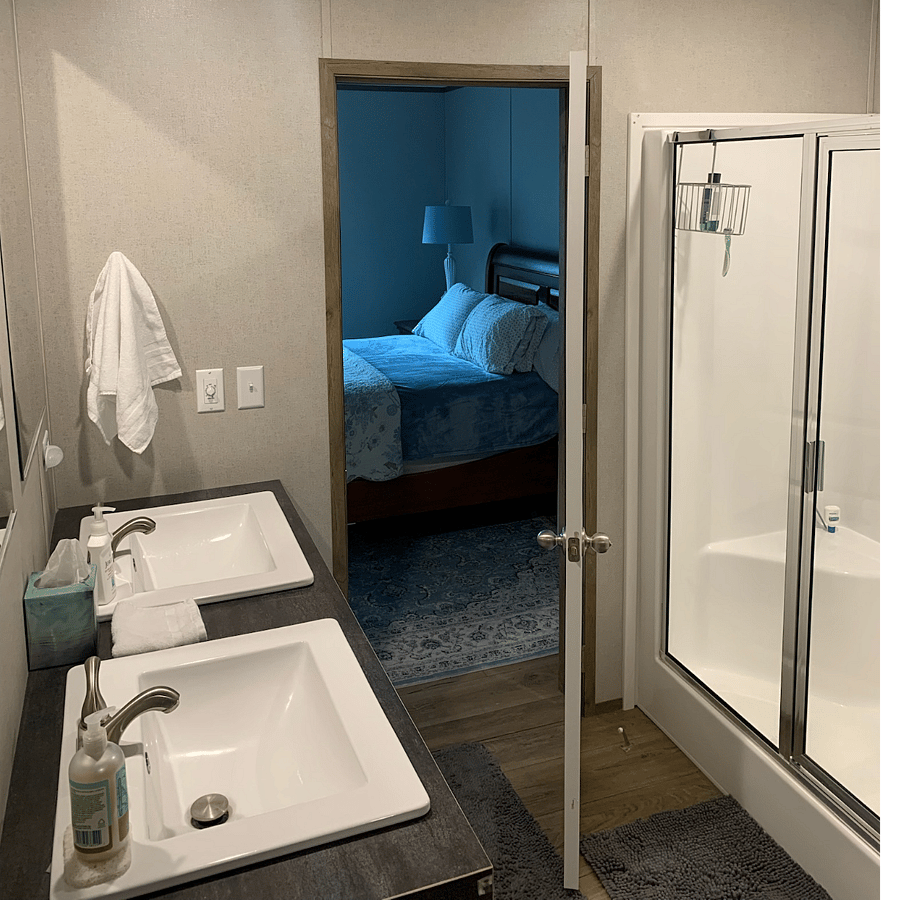 Master Bathroom with access to Master suite and laundry/kitchen area.