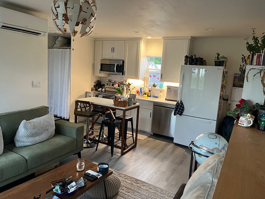 Kitchen and counter top dining table. Full sized kitchen appliances