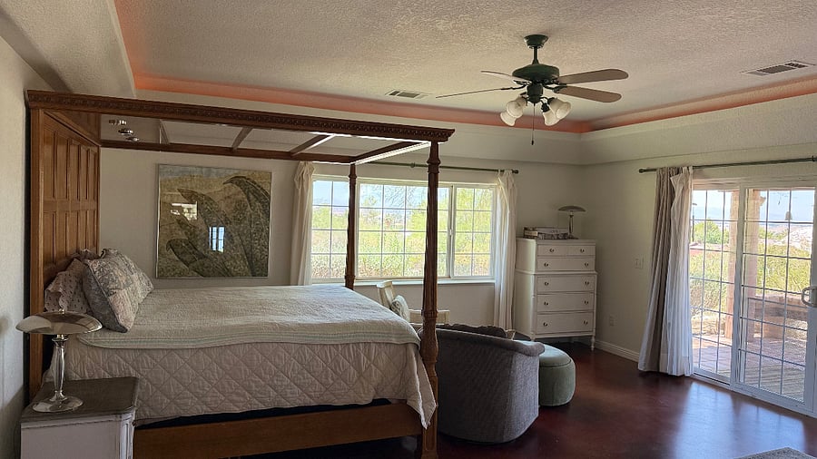 Large windows and patio door. Patio door is the private entrance to the living area