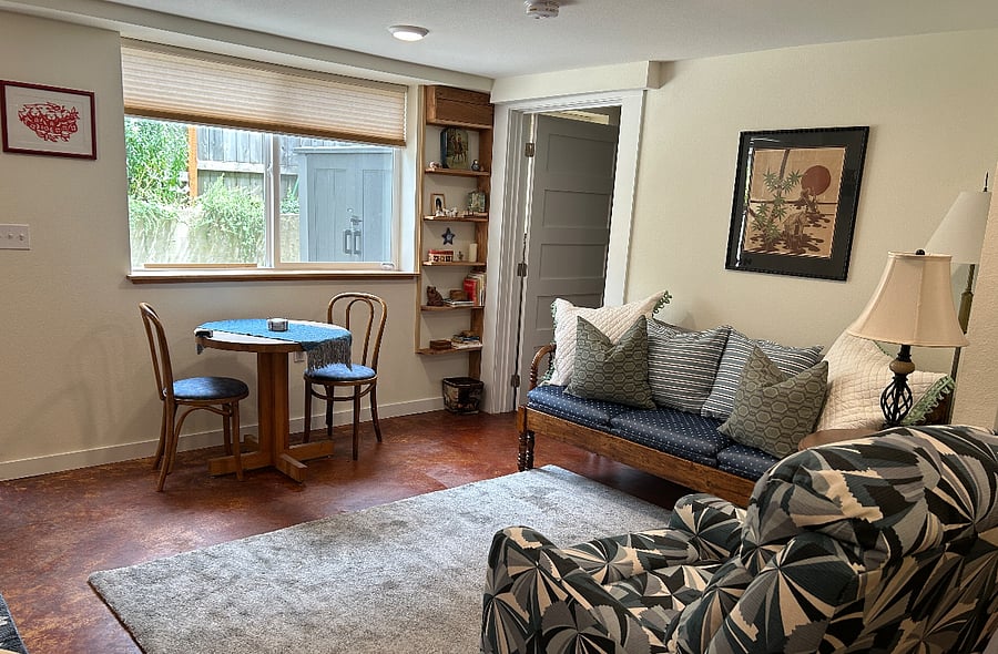 The table next to the daylight window can be used for dining and/or work or writing or drawing or computer time. There are shades on all the windows for privacy and room darkening.